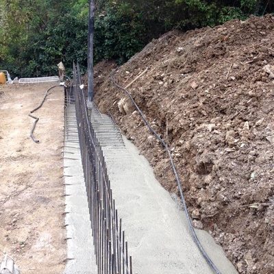 Construction of stone-clad walls and landscaping in Dolceacqua (IM)